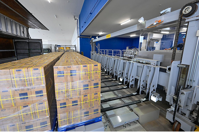 The largest home delivery water factory in Japan. Truck loaders are used for shipping.