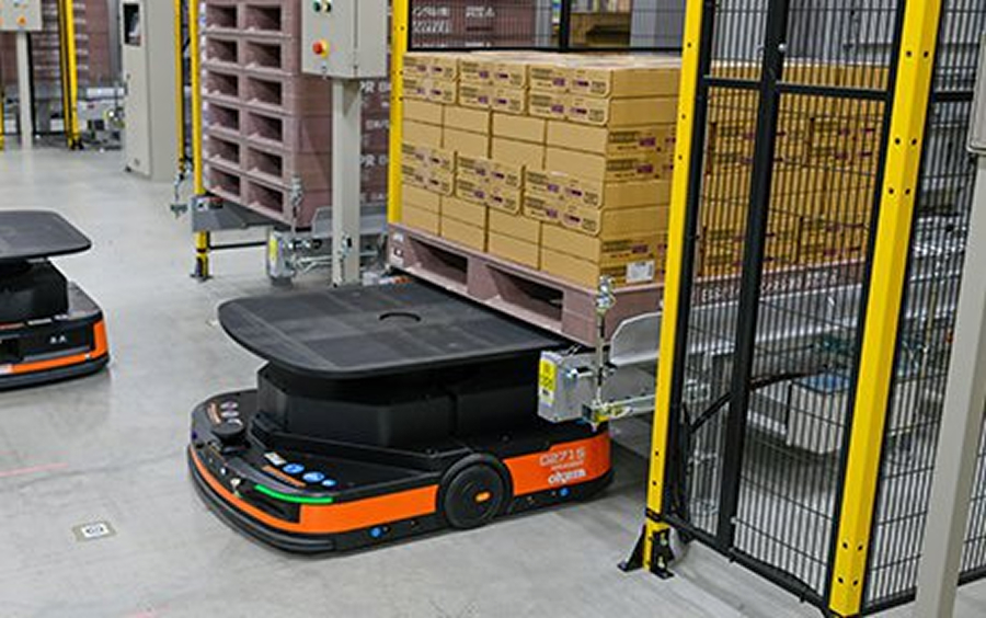 AGV picks up loaded pallets