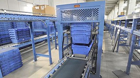 Empty plastic container stacking device